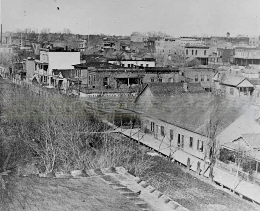 An elevated view looking over a city, 1880