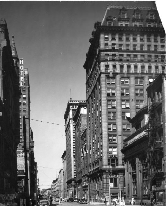 A Glimpse Along the Wall Street of St. Louis, 1935. Looking north on Broadway from Pine street, where numerous banking institutions make their home.