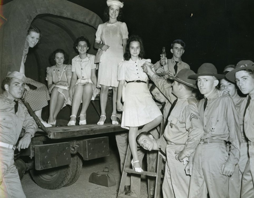 The opening gunof the social season for the Citizens' MilitaryTraining Corps is a dance at Jefferson Barracks, 1939