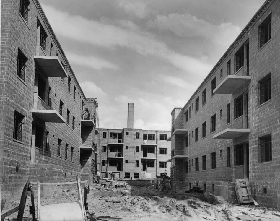Exterior of Neighborhood Gardens Apartments. Construction is nearing completion, 1930