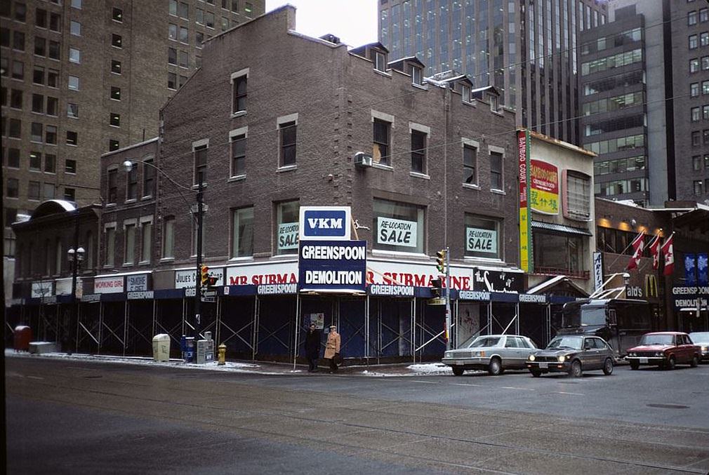 Building under demolition, 1980