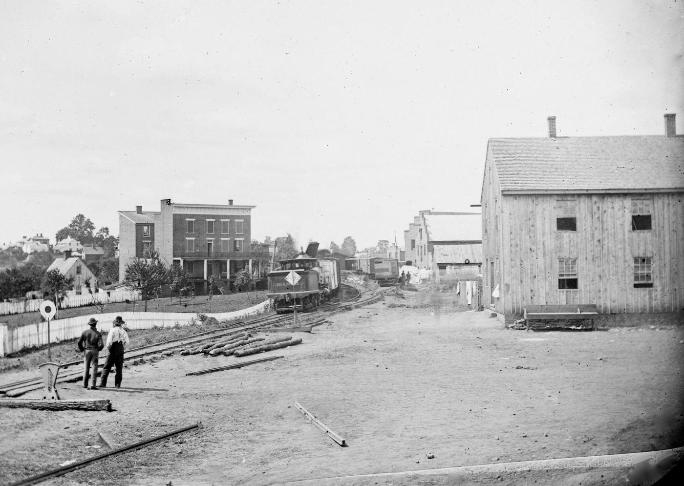 View near train depot showing a locomotive on the Orange & Alexandria Railroad, Culpeper Court House, VA, 1862.