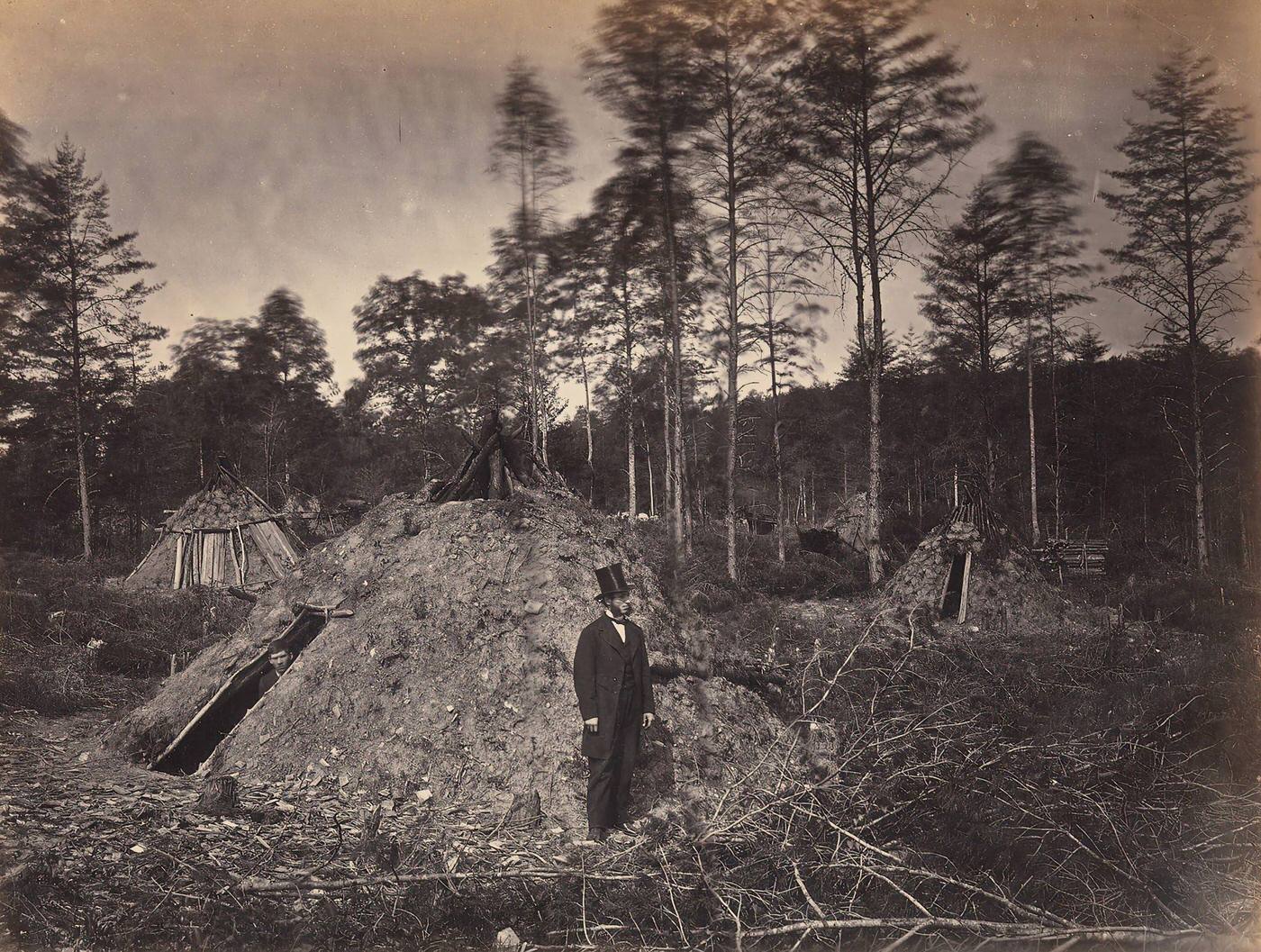 Woodchoppers' Huts in a Virginia Forest. On the Orange & Alexandria Railroad. Wood Supplied U.S.M.R. Railroads under Supervision of Major Brayton, June 1863.