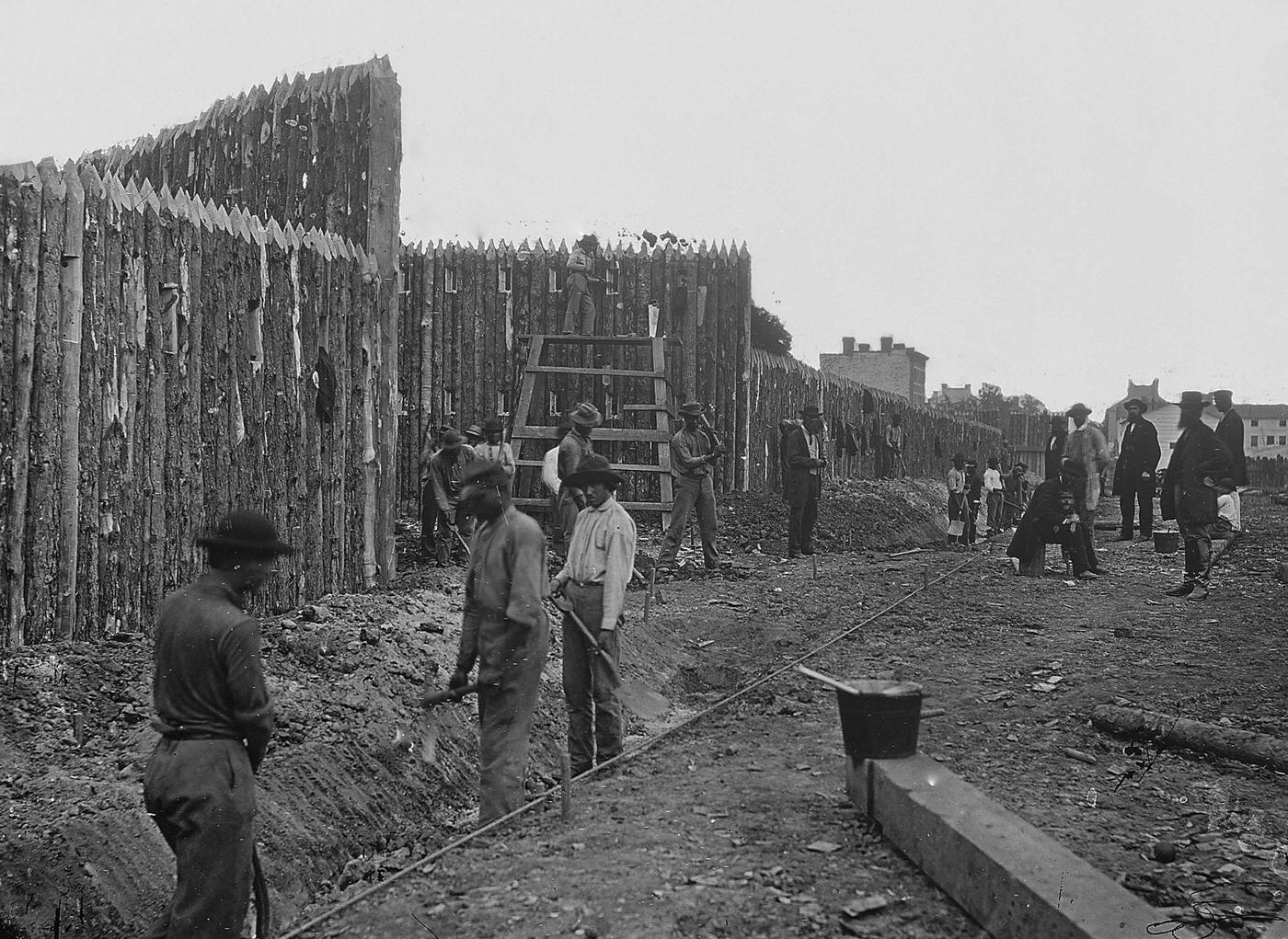Workers build fortifications and barricades, Alexandria, Virginia, 1860s.