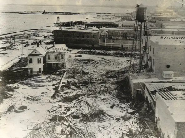 Water Street looking south following the 1919 hurricane, the labeled home was 505 Water Street at the corner of Schatzell Street and the home of Eli Merriman, one of the Caller's founders.