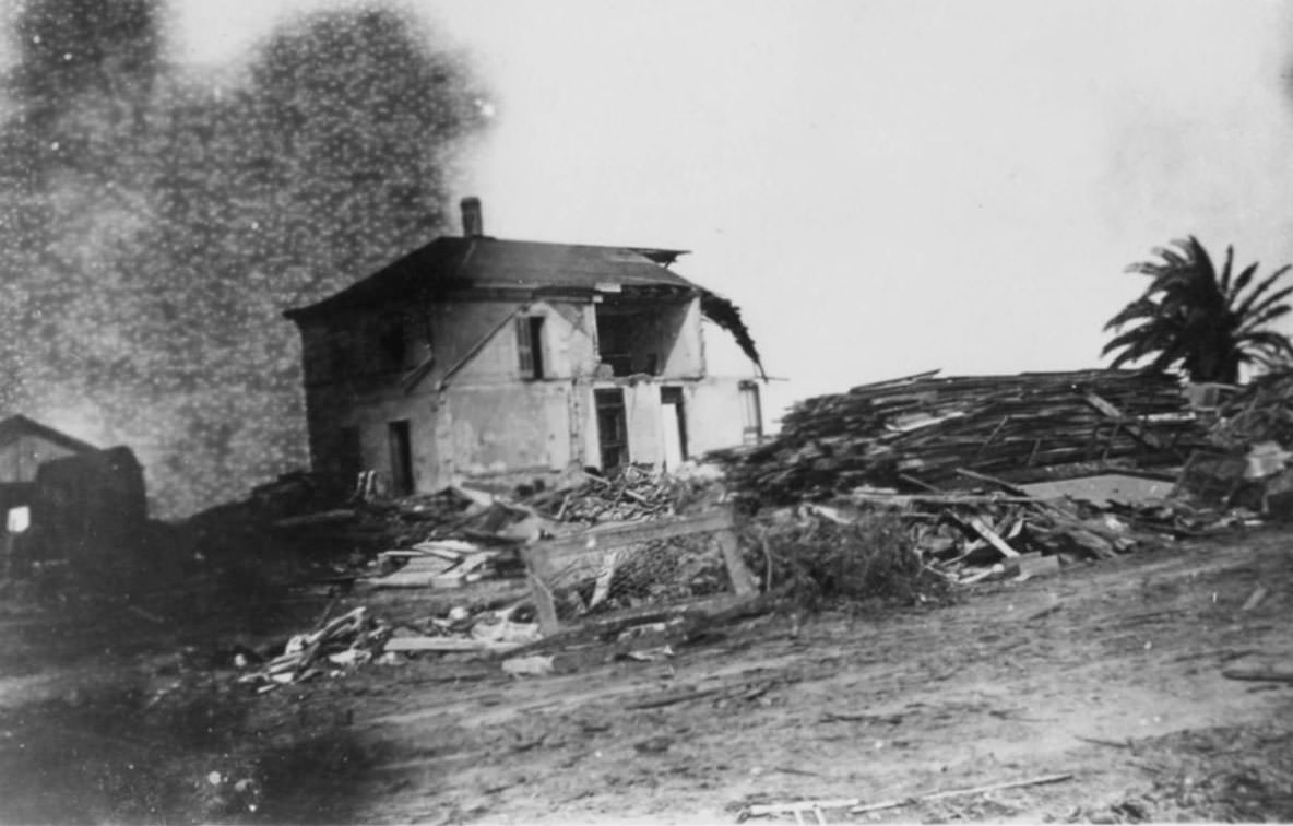 Damaged Seaside Hotel with debris around it, 1919