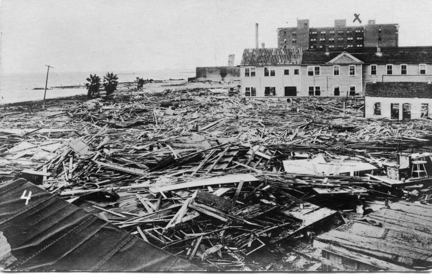 Buildings along the shoreline surrounded by debris after the Corpus Christi hurricane of 1919.