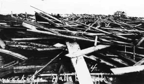 The wreckage from the 1919 hurricane was piled at the edge of Hall's Bayou.
