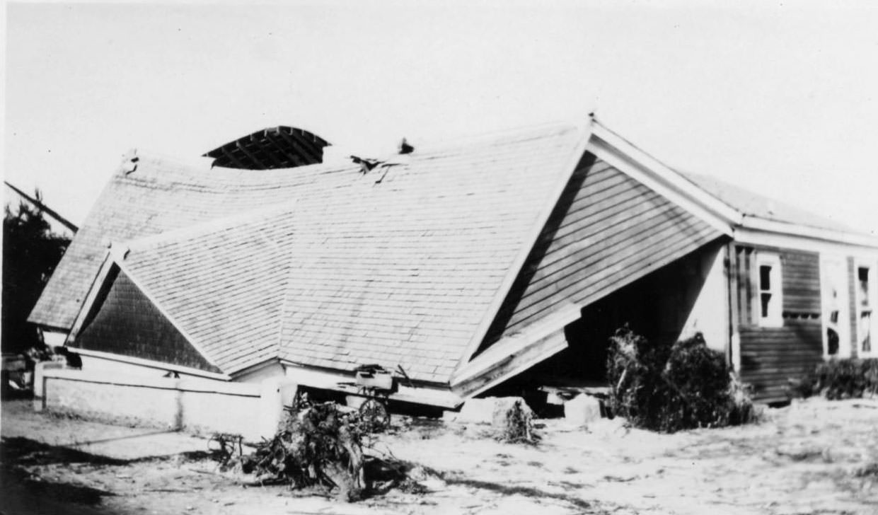 An unidentified brown cottage in Corpus Christi, Texas around the time of a hurricane in 1919.