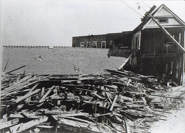 The Plaza Hotel in downtown Corpus Christi ner Artesian Park was pushed into Chaparral Street by debris and the storm surge from the hurricane that hit Sept. 14, 1919.