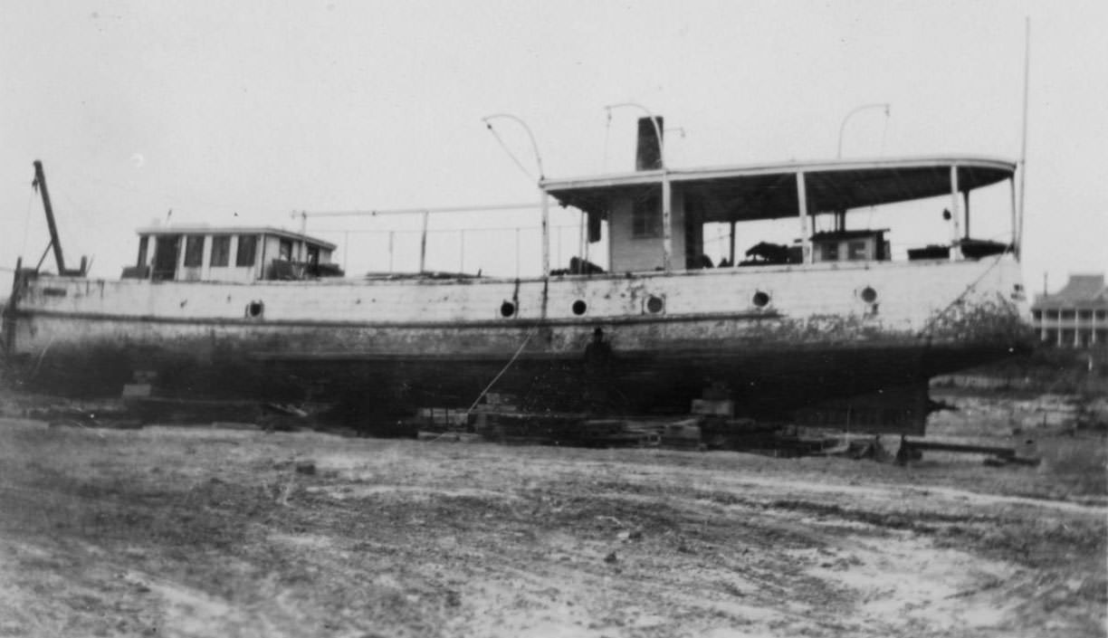 The Japonica sitting on the beach in Corpus Christi, Texas around the time of a hurricane in 1919.