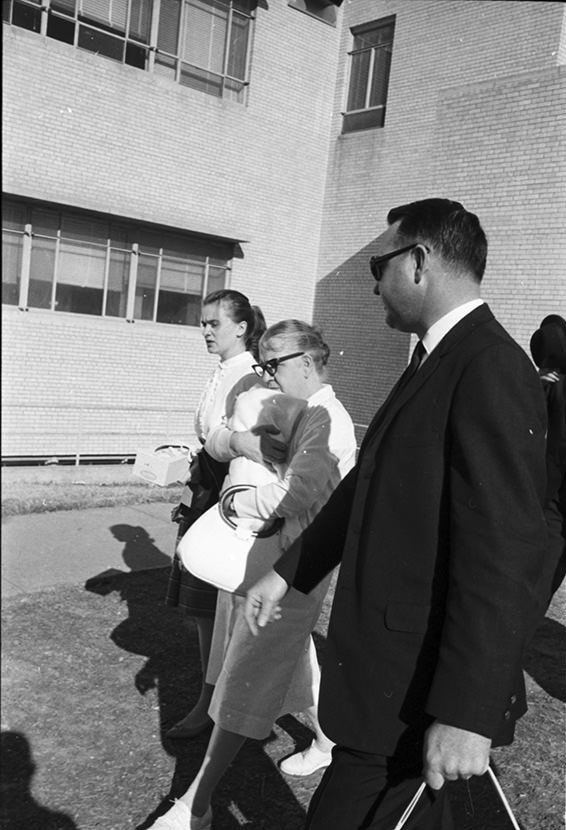 Marina and Marguerite Oswald with Marina's children walking into Parkland Hospital morgue following Lee Harvey Oswald's death, 1963