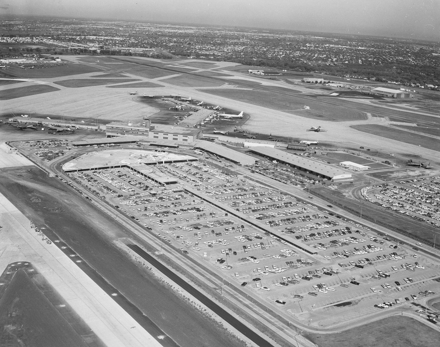 Parking area and runway at Love Field, Dallas, 1960