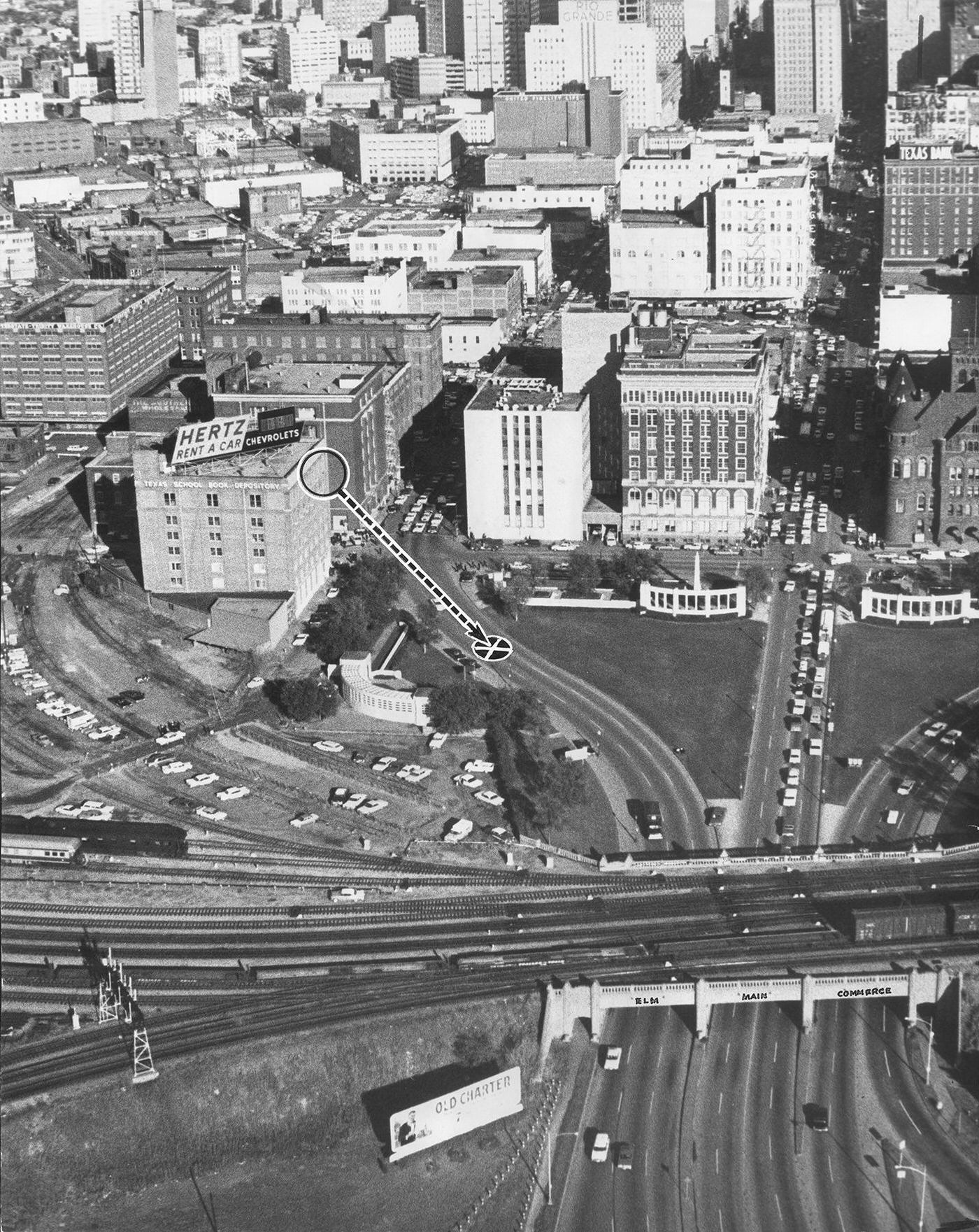 Airview of Dealey Plaza and Texas School Book Depository following assassination of President John F. Kennedy, 1963