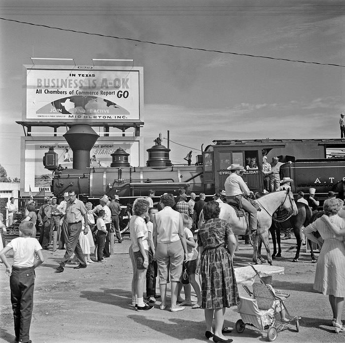 The Atchison, Topeka, & Santa Fe Railroad made a stop in Garland during summer 1965 to an excited crowd.