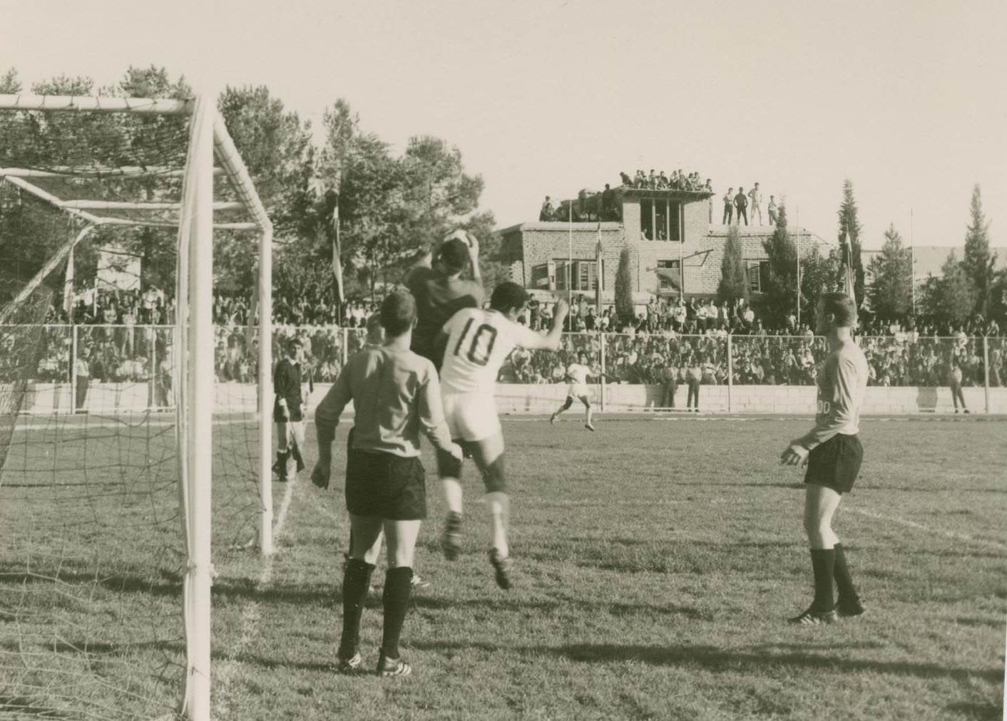 A soccer game between the Dallas Tornado Soccer Club and an Iranian team during the club's tour in Shiraz, 1967
