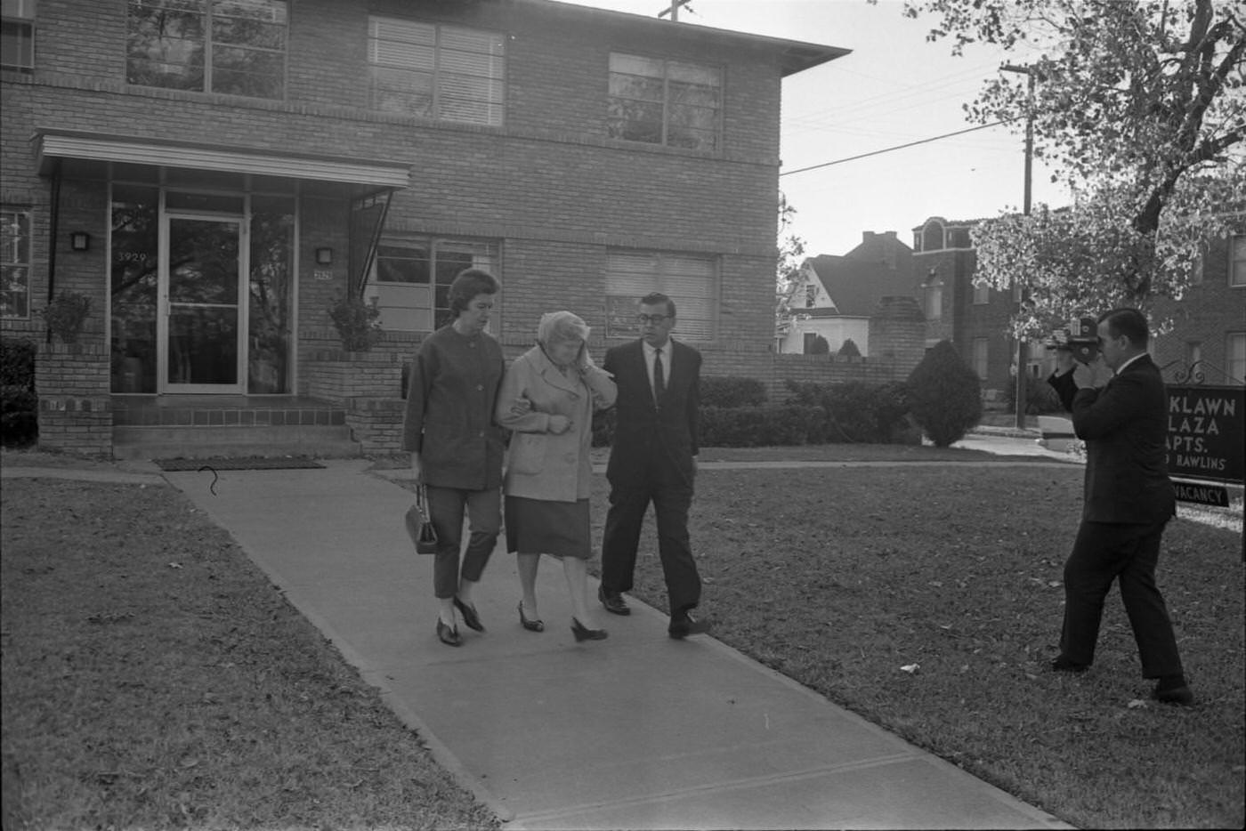 Jack Ruby's sister Eva Grant leaving for the Dallas Police Department, 1963