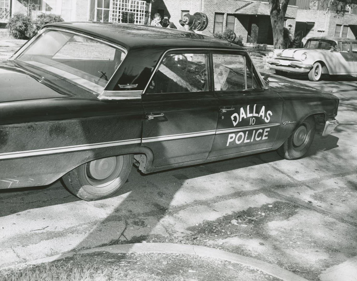 Dallas Police squad car headed east towards the Tippit crime scene, 1963