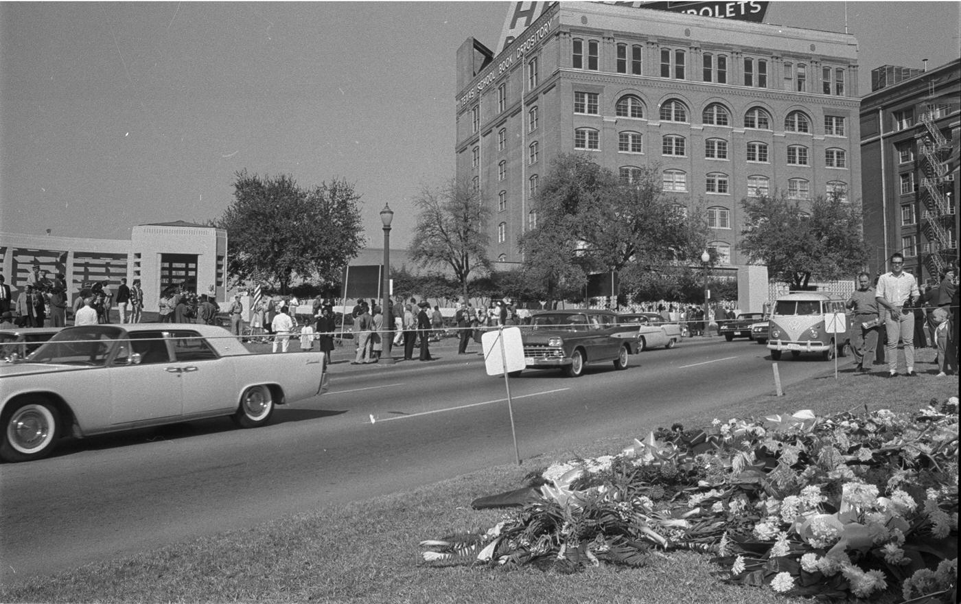 Dealey Plaza, Dallas, Texas, showing area near Texas State Book Depository building following President John F. Kennedy's assassination, 1963