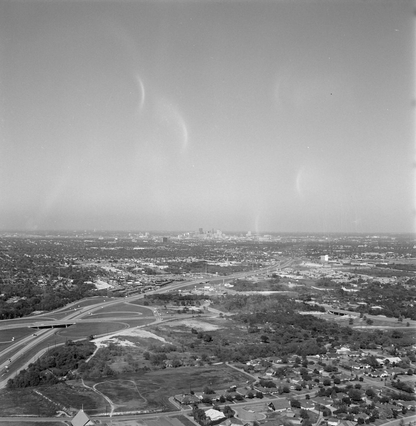A distant view of downtown Dallas from a blimp, 1969