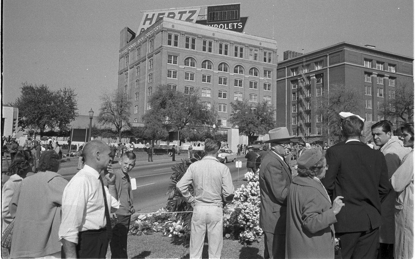 Dealey Plaza, Dallas, Texas, showing area near Texas State Book Depository building following President John F. Kennedy's assassination, 1963