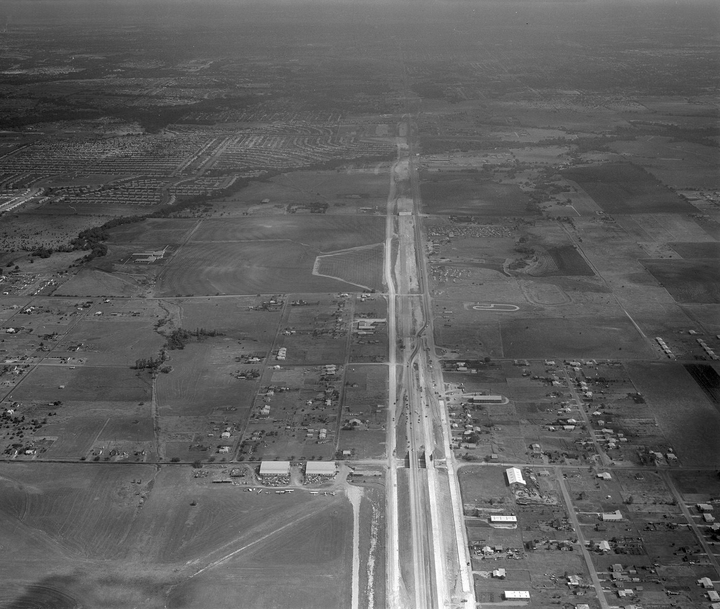 Aerial view of Highway 775 and Danieldale, 1960s