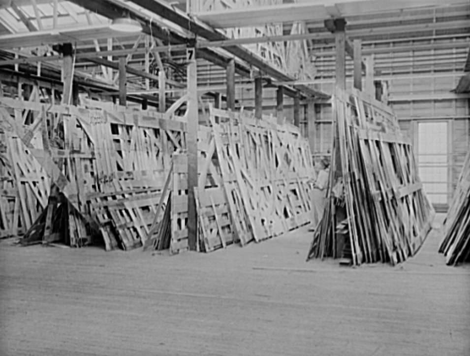 This is the storage space in the moulding loft where the many templates for ships' parts are fashioned in wood, 1941