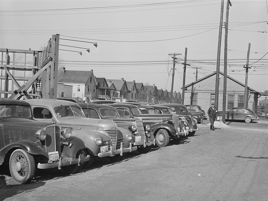 Workers' cars packed near shipyard. Newport News, Virginia, 1941