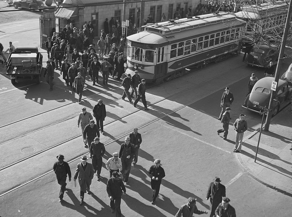 Shipyard employees getting out at 4:00 p.m. Newport News, 1941