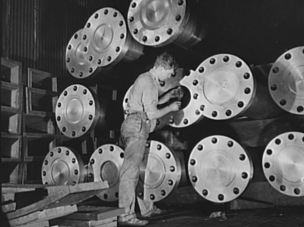 Here is driving power for the Navy, a group propeller shafts waiting for installation in new destroyers for our two-ocean Navy, 1941