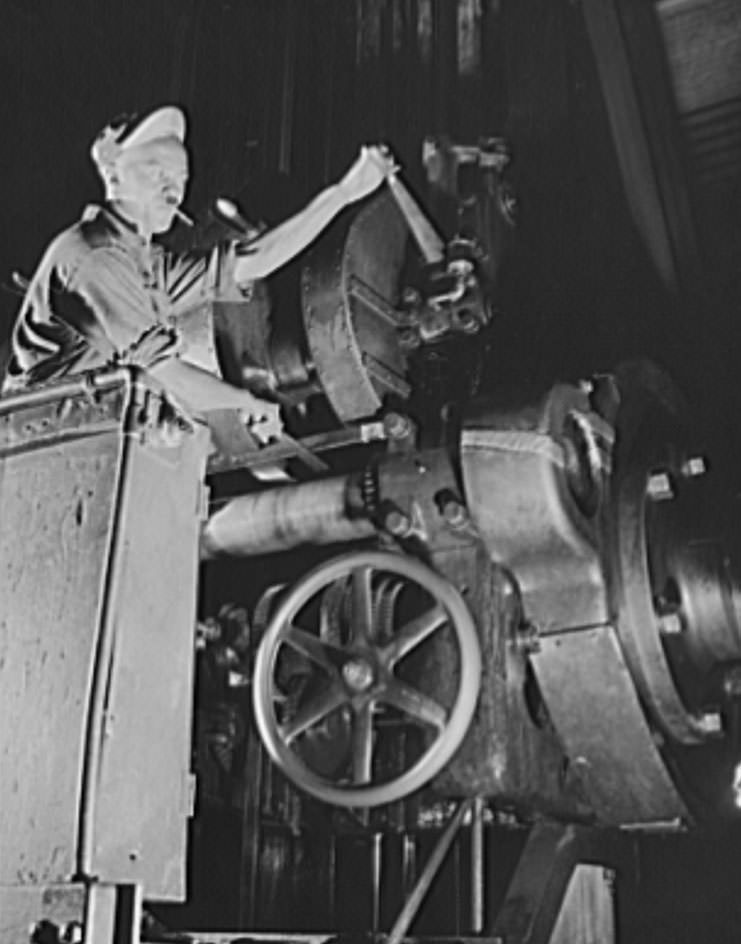 There are many complicated machining operations involved in the production of ships for our two-ocean Navy. This skilled worker is one of thousands at the Newport News ways, 1941