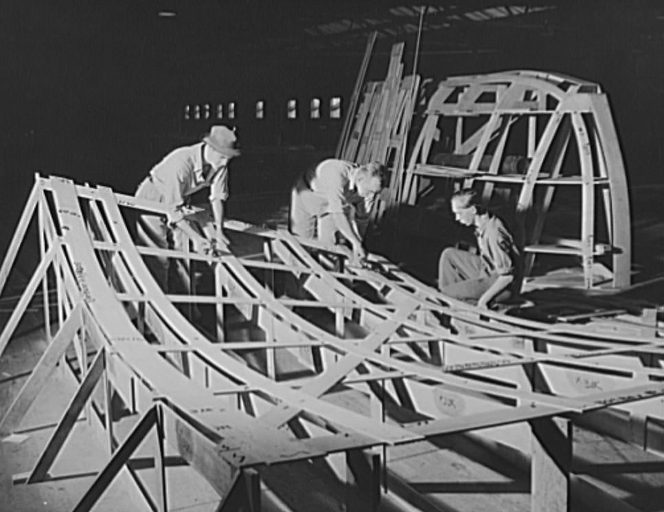 (Newport News). These are mold loft workers laying out patterns for various parts of naval vessels under construction, 1941