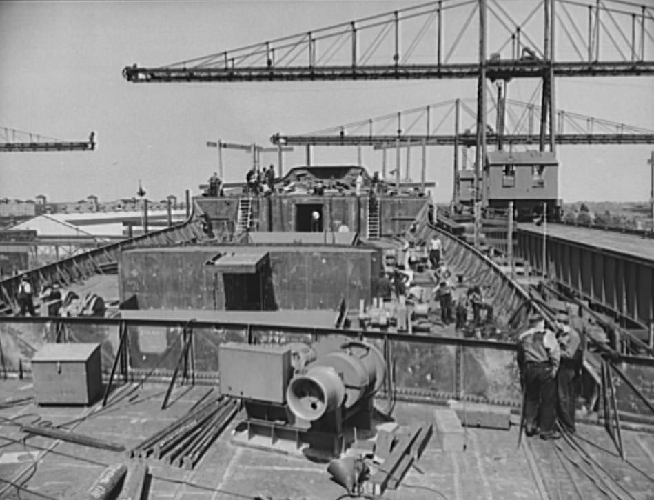 The forward deck on a C-3, photographed from the bridge. Winch in foreground; winch platform in center of picture, 1940