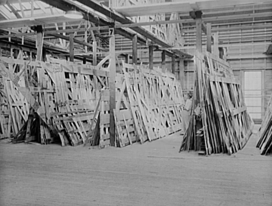 This is the storage space in the moulding loft where the many templates for ships' parts are fashioned in wood. These patterns are then transferred to steel, 1941