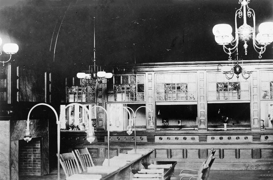 Reading room in the Dedham public library, Dedham, Massachusetts with ornate counter or delivery desk, 1905