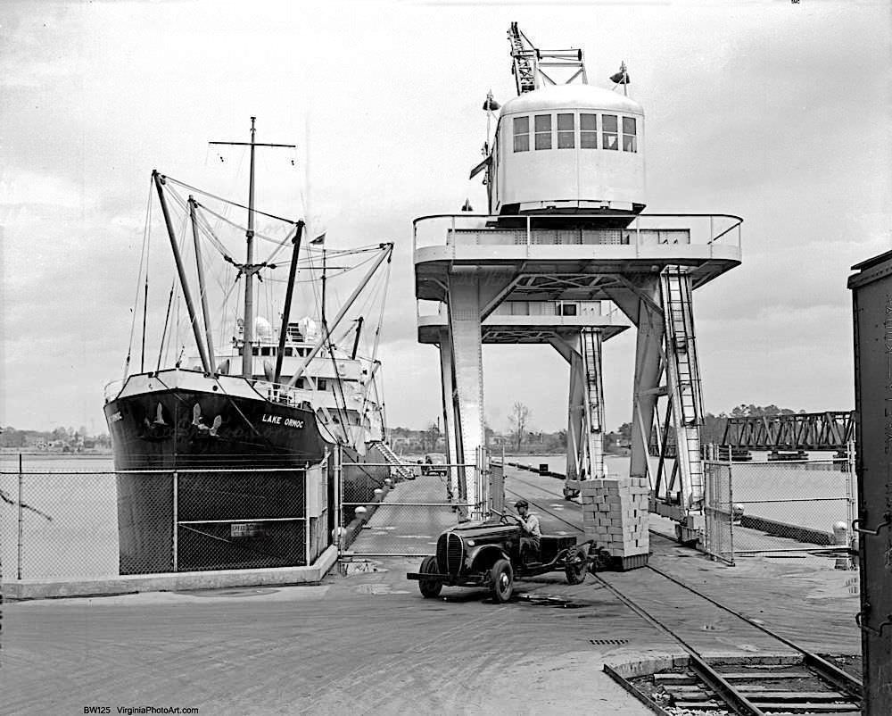 Ford Truck Unloading Cargo at Docks Ship Lake Ormoc, 1944