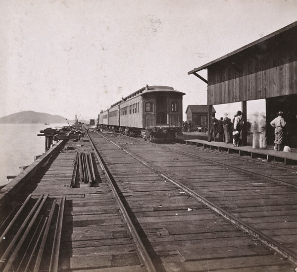 Train leaving Oakland Wharf for New York, 1864