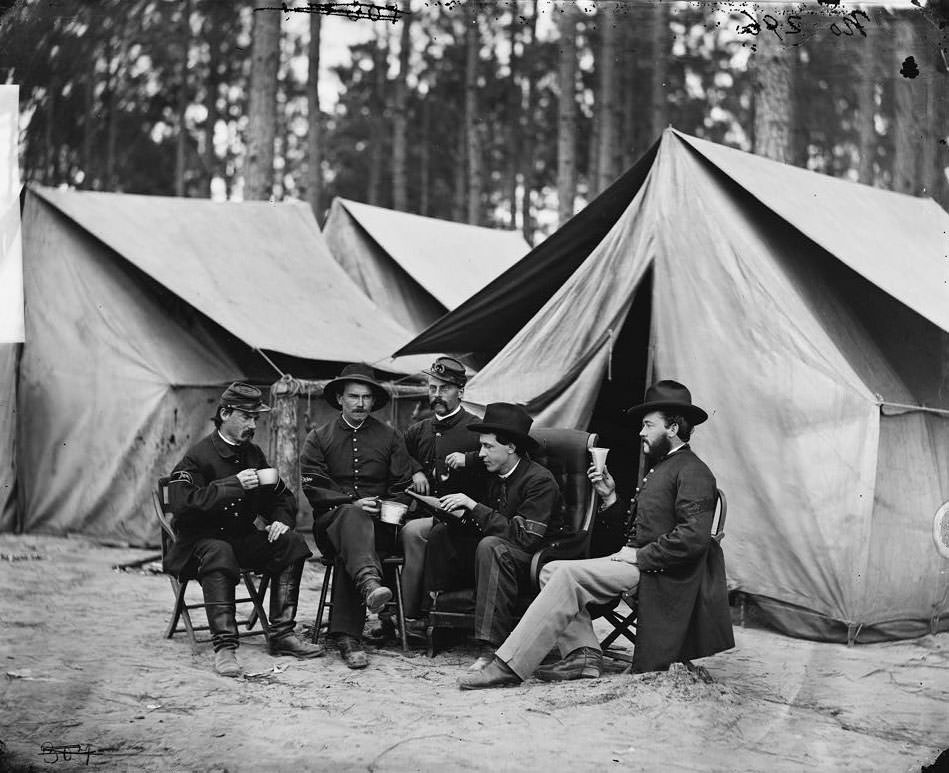 Hospital stewards of 2d Division, 9th Corps, in front of tents, 1864