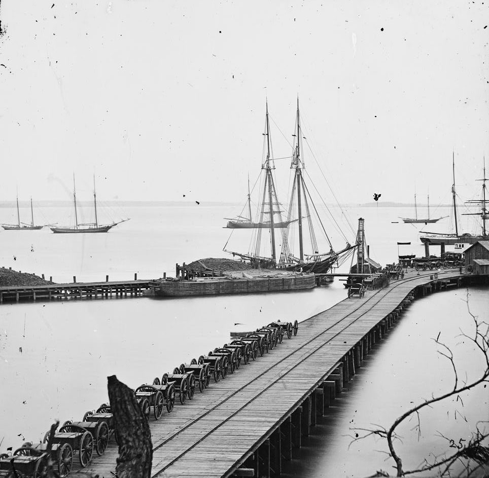 Wharf, Federal artillery, and anchored schooners, Petersburg, 1860s