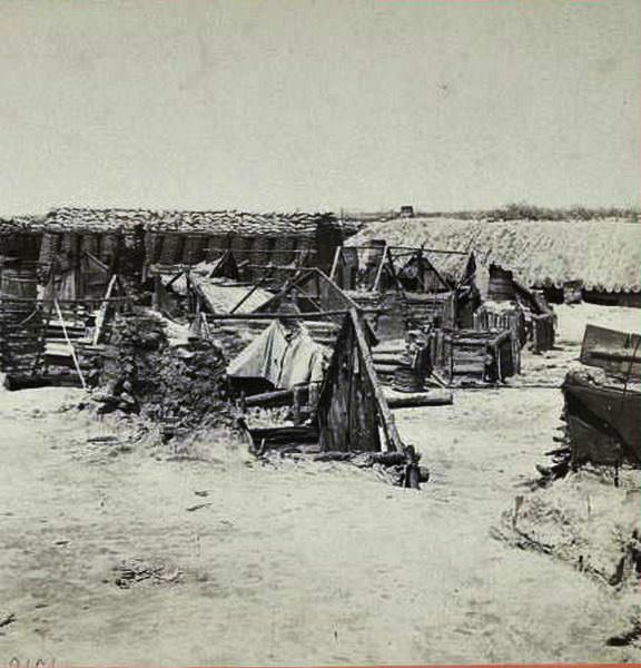 Soldiers' quarters in the Union Fort Rice adjoining Fort Sedgwick (fort Hell".), 1865