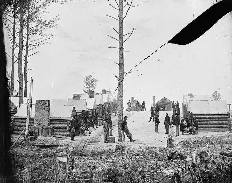General view of camp of Oneida, N.Y., Independent Cavalry Company at Army headquarters, with men at leisure, 1865