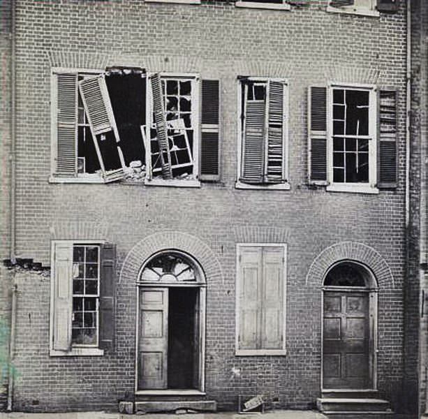 Effects of shot and shell on the north side of Petersburgh, Bollingbrook St. View of Dunlop house, 1860s
