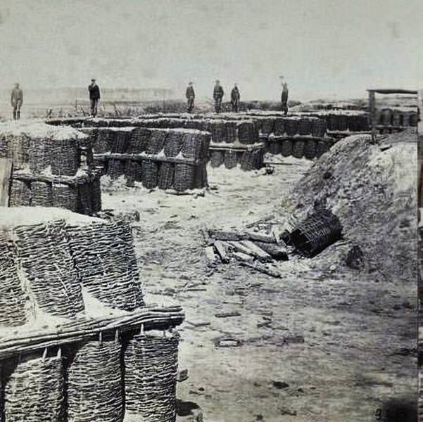 Interior of the Union Fort Sedgwick, called by the rebel soldiers "Fort Hell," showing Union soldiers on the breastworks, 1865