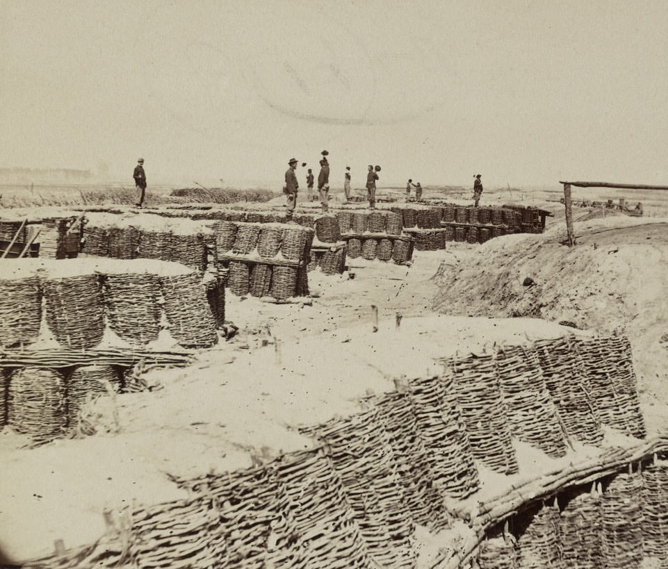 A group of soldiers stand on gabions used as fortifications near Petersburg, 1860s