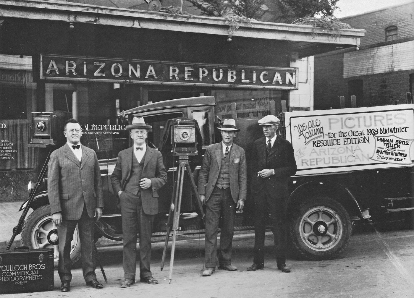 The McCulloch Brothers Commercial Photographers posing in 1928 outside the Arizona Republican offices.
