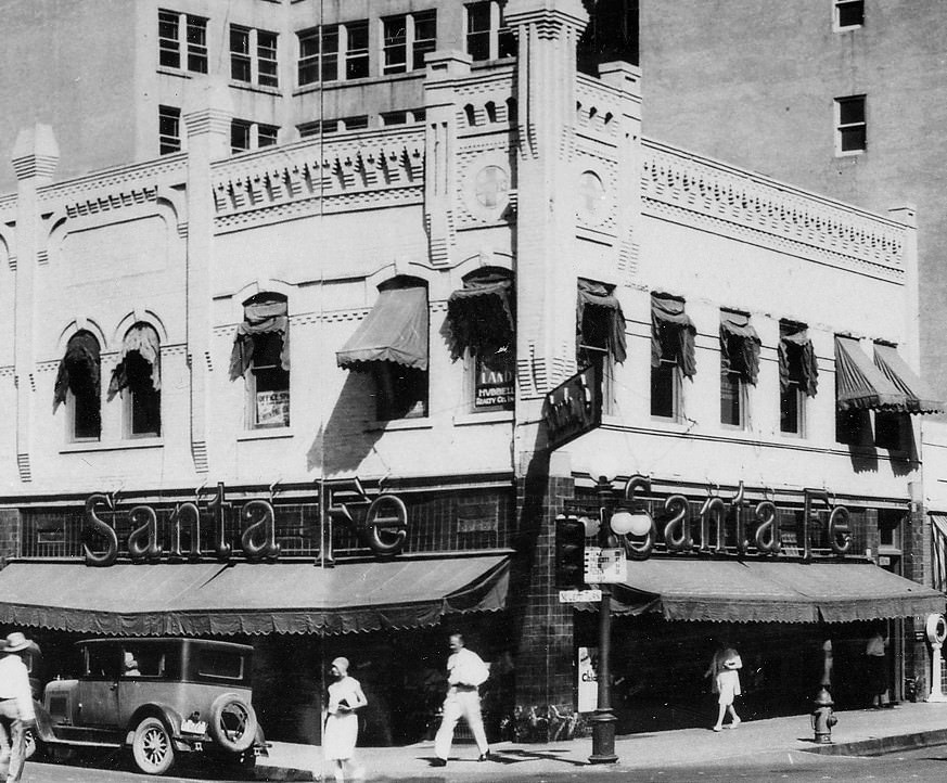 The AT&SF Railway ticket office on the northwest corner of Adams and Central. It's still there, under ugly stucco. The city's ubiquitous awnings were real "shade structures."