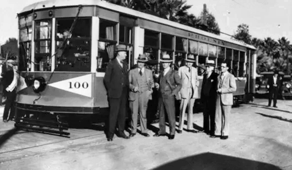 Mayor Louis P. Whitney (third from right ) and the City Commission pose with Phoenix streetcar No. 100 on its first run Christmas Day, 1928.