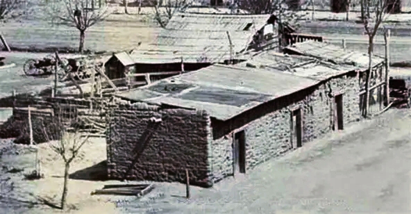 Even as the city grew, old adobe structures survived amid the newer, wood and brick buildings.