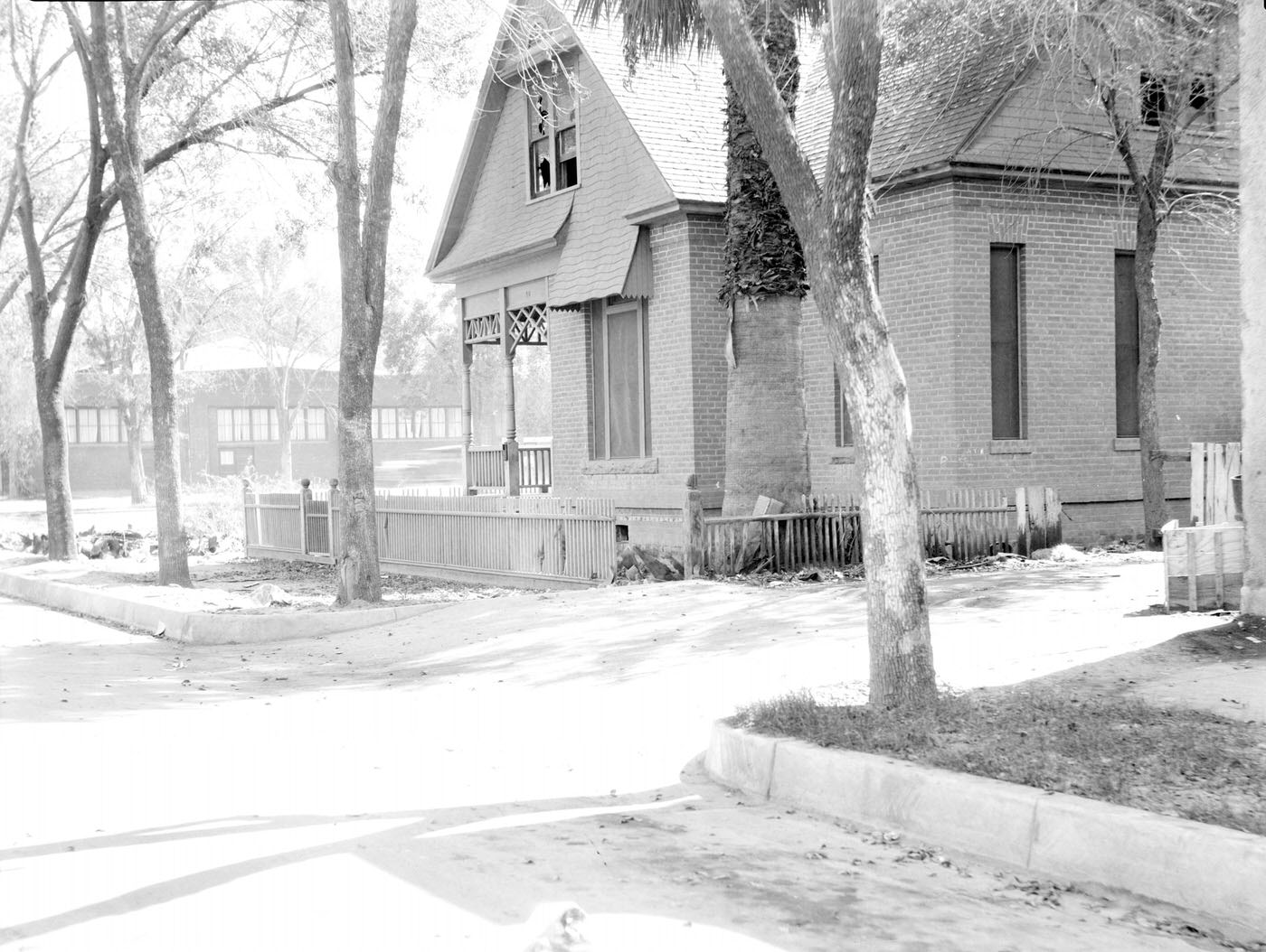 View of Polk Street looking East toward First Street. A dance hall that burned in the early 1920s is visible in the background.