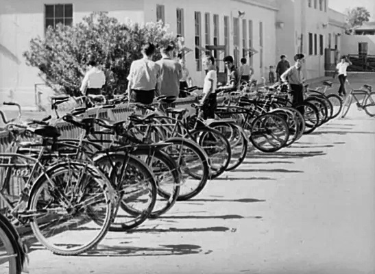 Bicycles are parked outside Phoenix Union High School in May 1940.